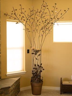 The metal tree with the old (bottom) and the new (top)