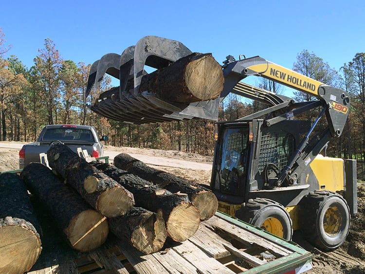 loading-burned-trees-onto-trailer